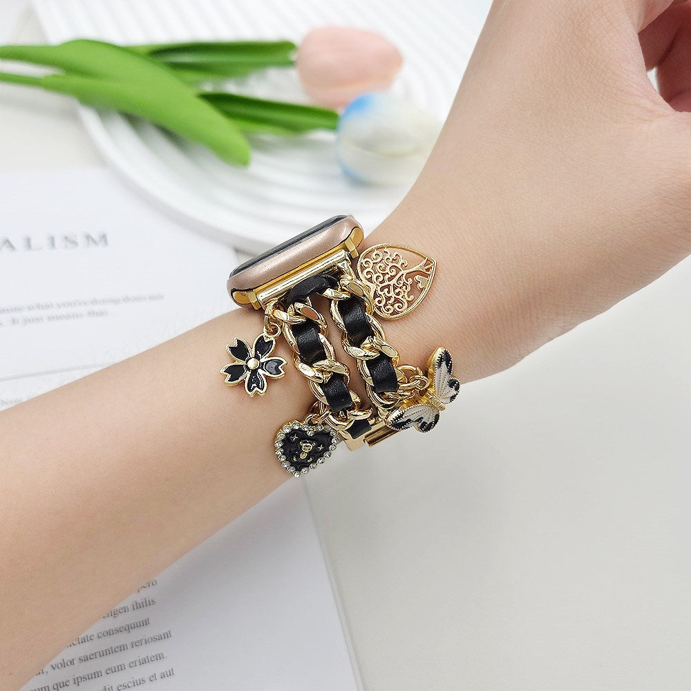 Apple Watch (38 / 40 / SE / 41 / 42mm) - EIDERWOOD Metal Rem m. Vegansk Læder & Vedhæng - Guld / Sort