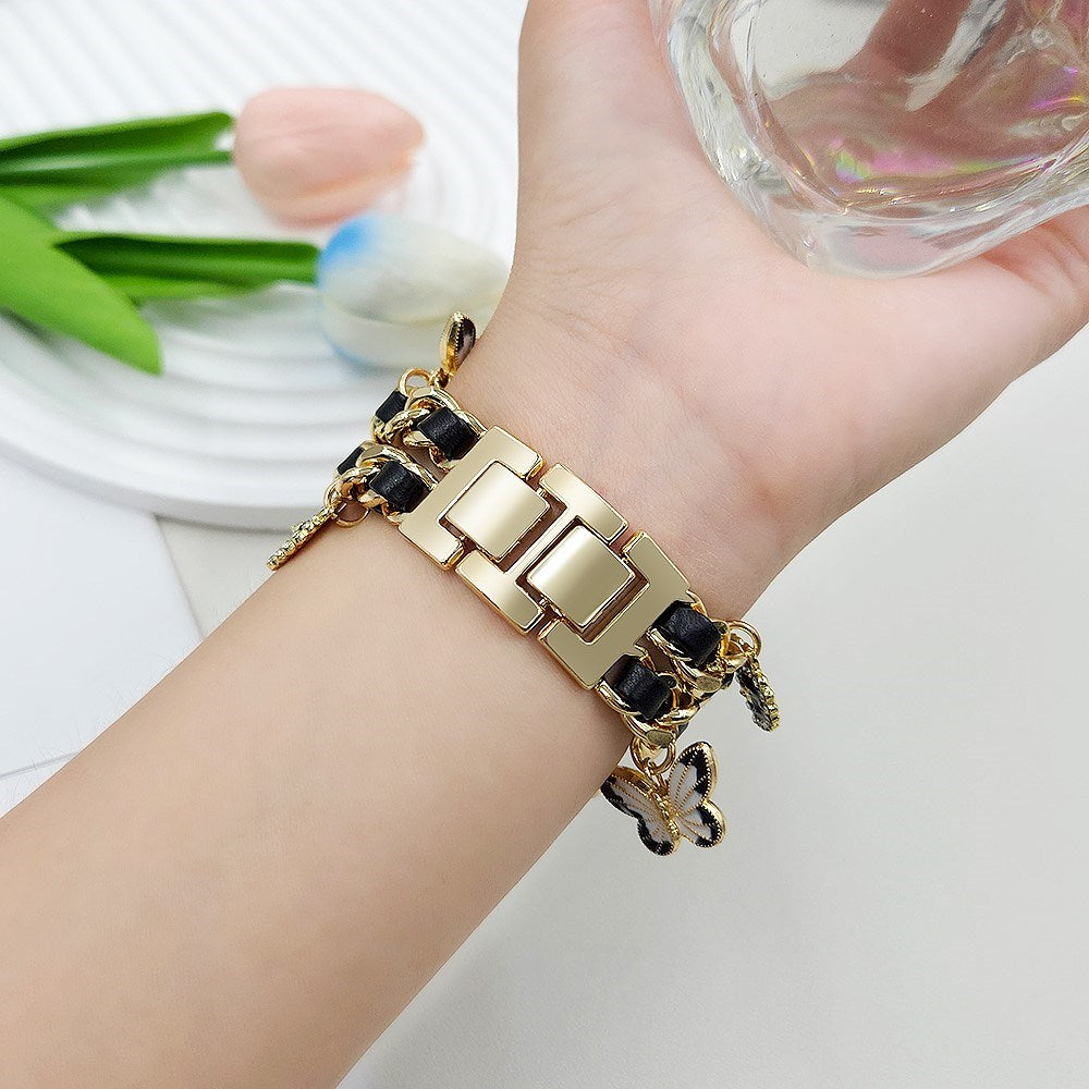 Apple Watch (38 / 40 / SE / 41 / 42mm) - EIDERWOOD Metal Rem m. Vegansk Læder & Vedhæng - Guld / Sort