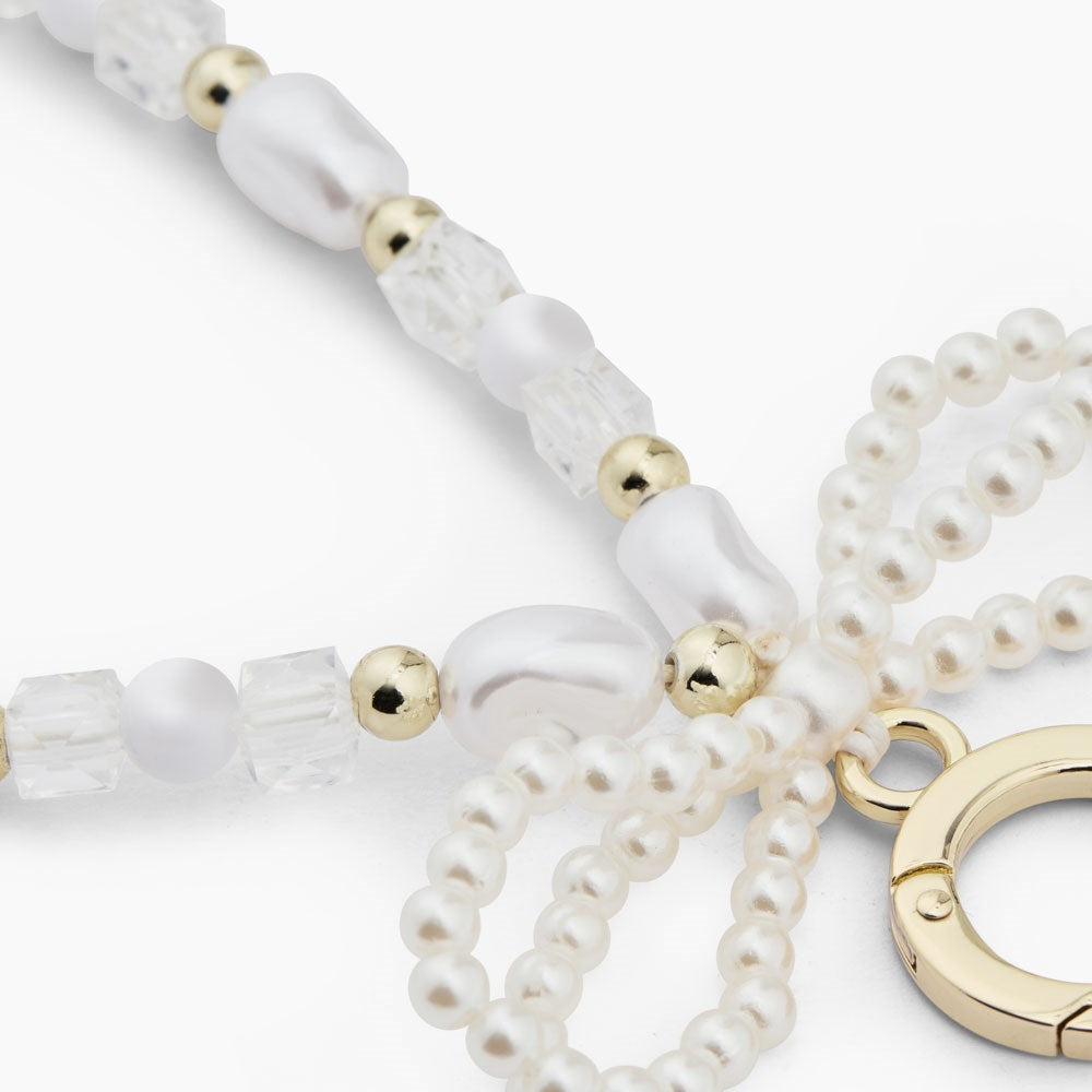 iDeal of Sweden Cord Universal Håndledsrem - Hvide Perler