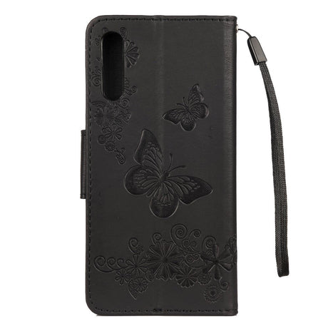 Samsung Galaxy A30s / A50 Læder Cover m. Pung Blomster og Sommerfugle Imprint - Sort