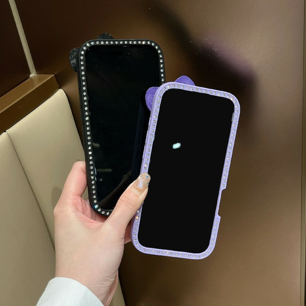 EIDERWOOD iPhone 16 Hybrid Bagside Cover m. 3D Sløjfe og Rhinsten - Gennemsigtig / Lilla