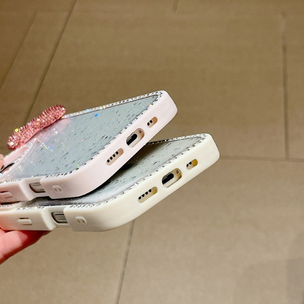 EIDERWOOD iPhone 16 Hybrid Bagside Cover m. 3D Sløjfe og Rhinsten - Gennemsigtig / Hvid